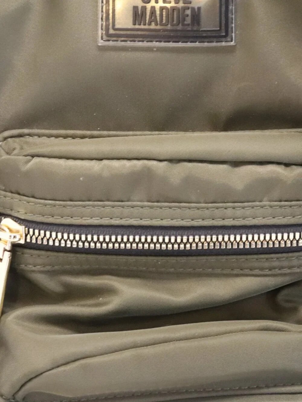 Steve Madden Mini Backpack with Zippers and a small Handle